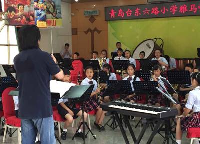 明升mansion示范乐团青岛台东六路小学管乐团大师班活动成功举办